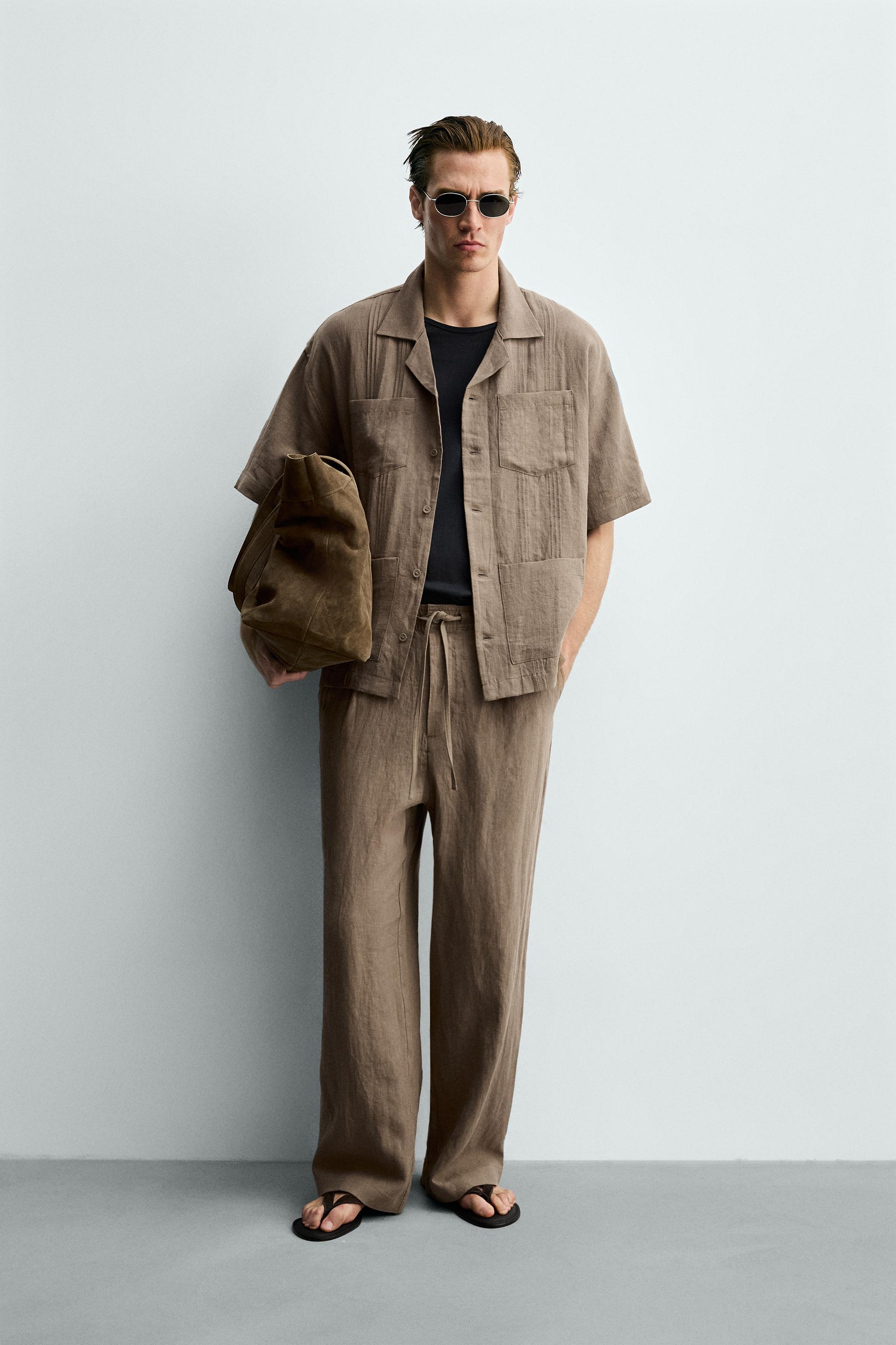RELAXED FIT 100% LINEN SHIRT WITH PLEATED POCKETS